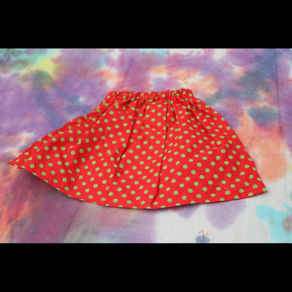 Green and red polka dot girls skirt